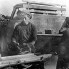 Бойцы ССО «Механик» выгружают еще горячий кирпич с завода. Палехский район, д. Пеньки, 1971 г.